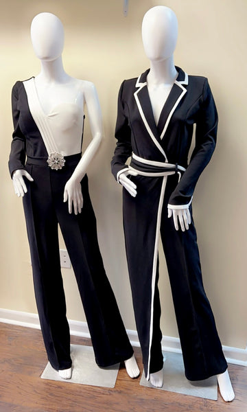   “Elegant black and white one-shoulder jumpsuit with crystal belt – Formal women’s jumpsuit from D’TWINS FASHION. Chic black wrap suit with white contrast trim and waist belt – Power suit for women at D’TWINS FASHION.”