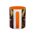 Mug with a colorful design and orange interior on a white background