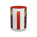 Tumbler with a red interior and handle, featuring colorful graphics on a white background