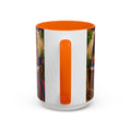 Tumbler with orange interior and colorful exterior design on a white background