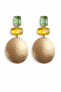 Gold earrings with green and yellow gemstones on a white background