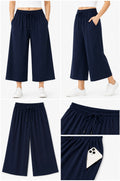 Navy blue wide-leg pants with a drawstring waist, shown from multiple angles on a white background.