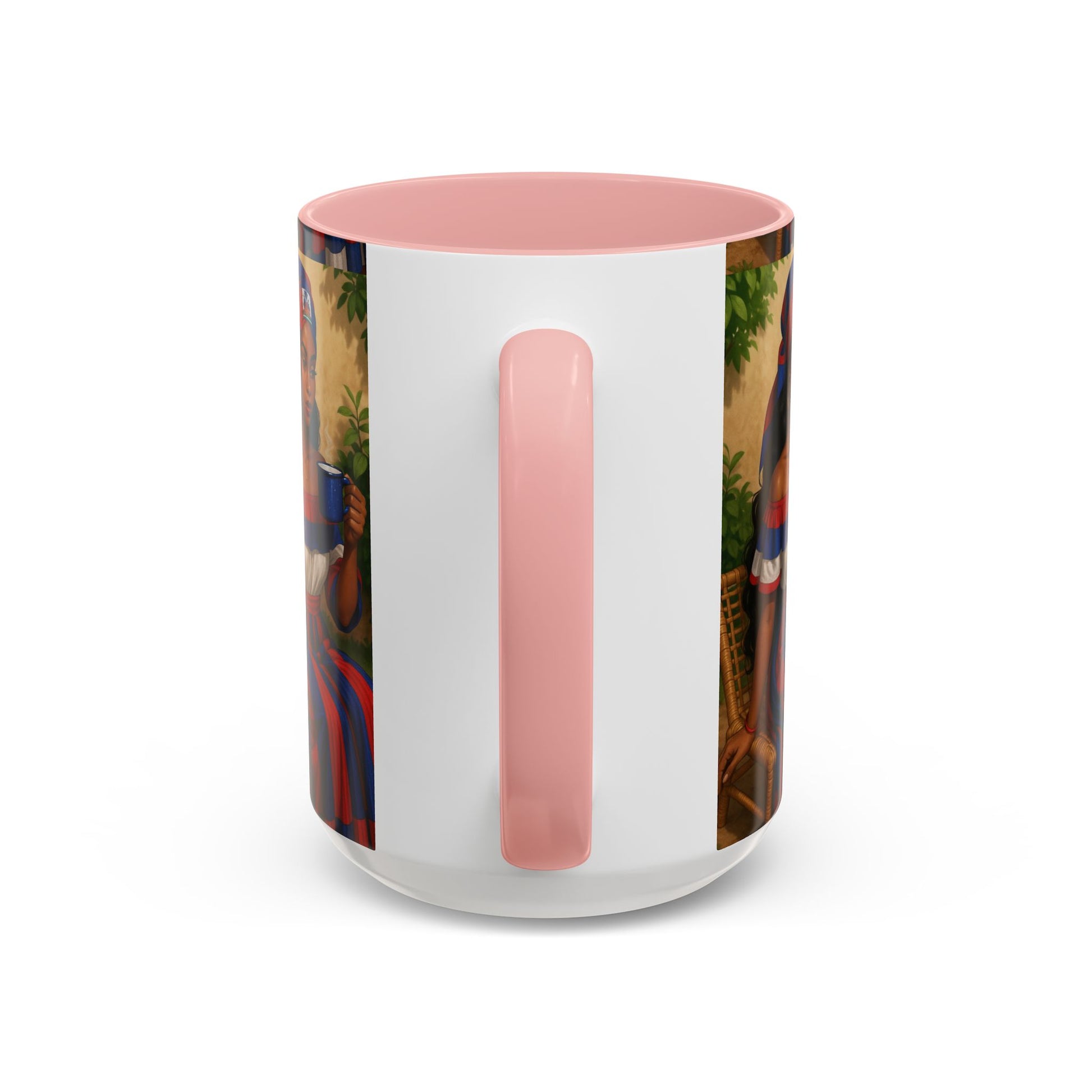 White mug with pink interior and handle, featuring a colorful design on the exterior