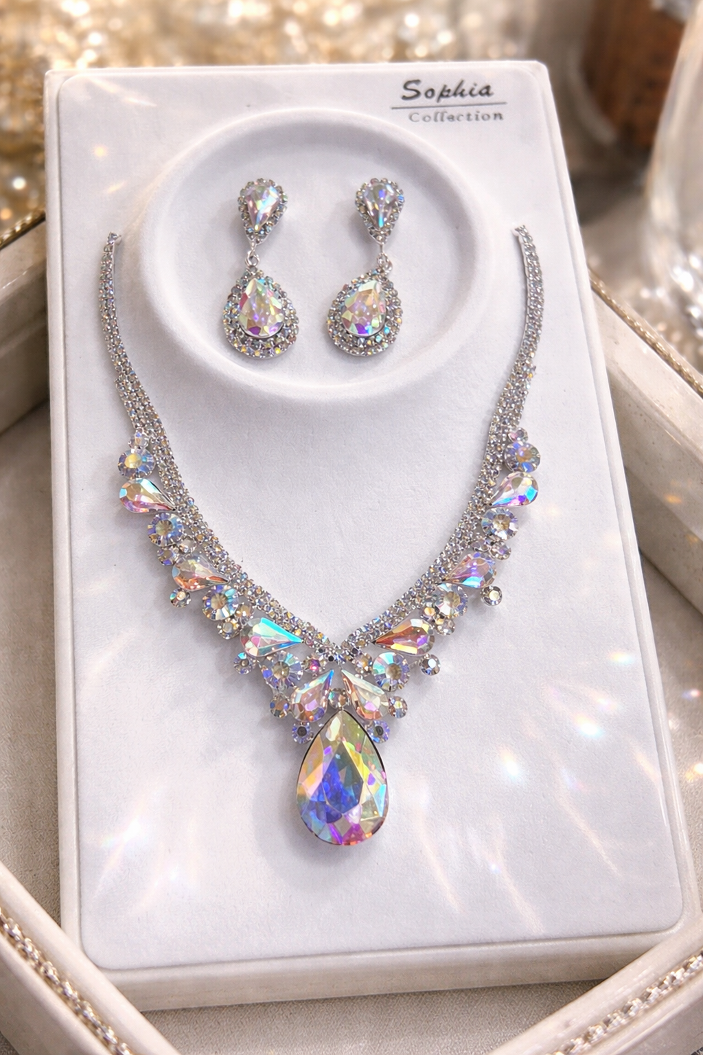 Jewelry set with necklace and earrings on a branded box