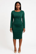 Green dress worn by a model on a white background