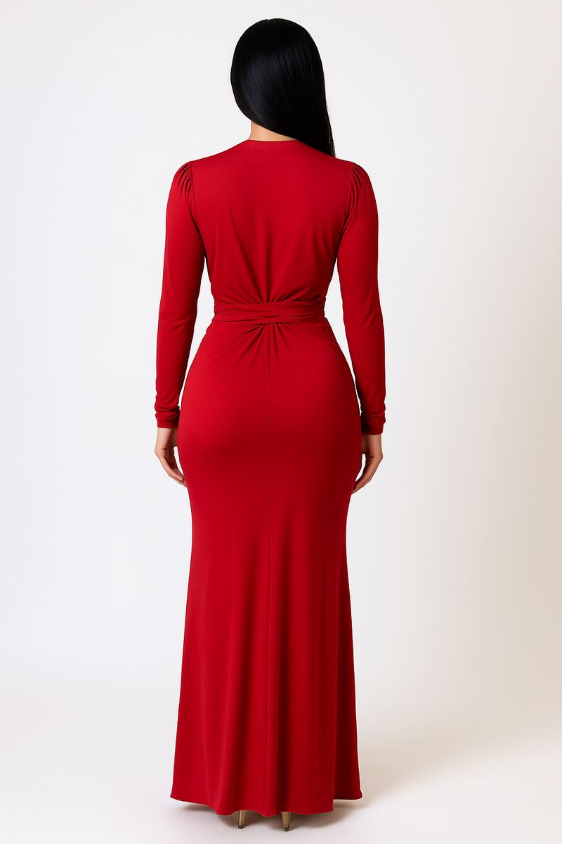 Red dress worn by a person on a white background