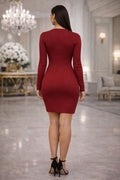 Woman wearing a red dress in an elegant indoor setting